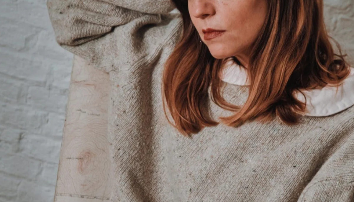 Women wear organic button down top