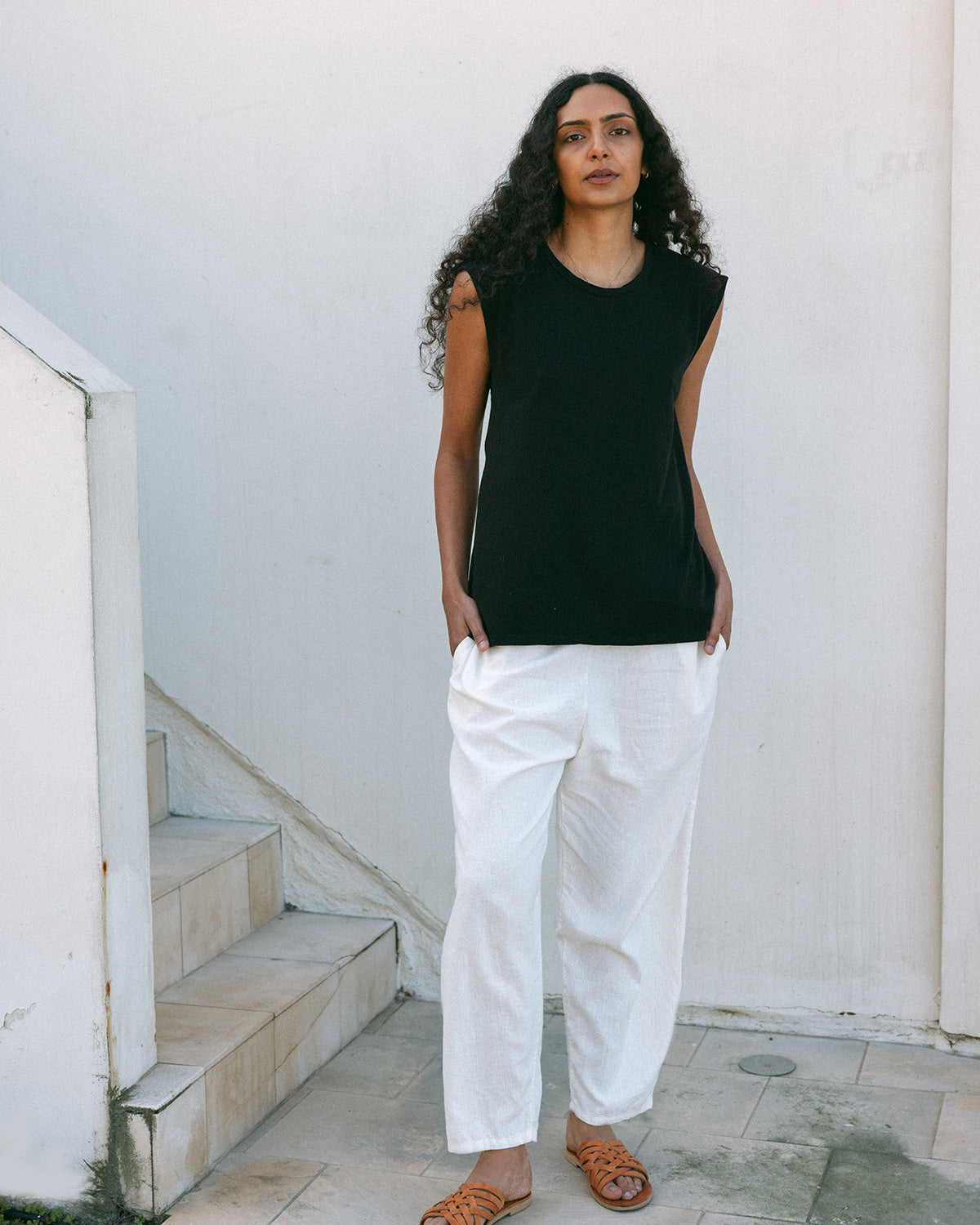 jersey muscle tee and white pants