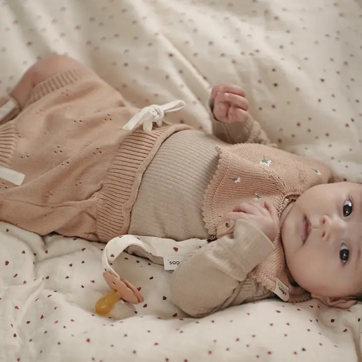 Knitted Baby Bib - sunbaked bloom