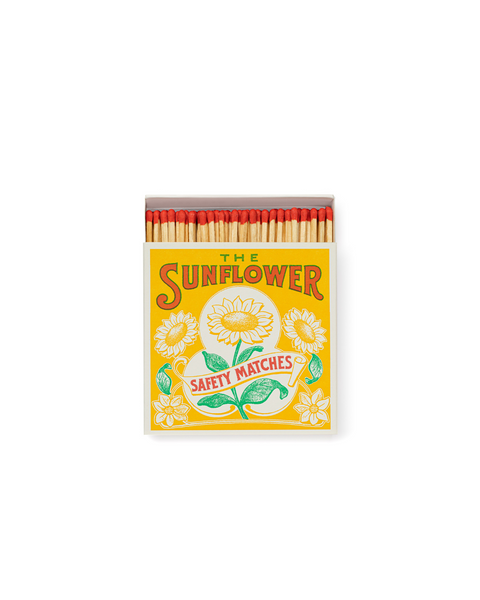 The Sunflower Luxury Matches are summertime on a matchbox. Sunshiney yellow, meadow-green and gorgeous floral illustrations make for one of the happiest designs you ever did see. The perfect way to make someone smile, whatever the weather.The Sunflower Luxury Matches are summertime on a matchbox. Sunshiney yellow, meadow-green and gorgeous floral illustrations make for one of the happiest designs you ever did see.