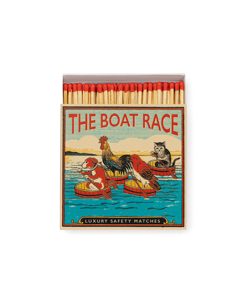 The Boat Race luxury matches depicts a rather peculiar scene, and we can't help wondering what they're racing for... Perhaps a human dropped their lunch somewhere on the other side of the river.