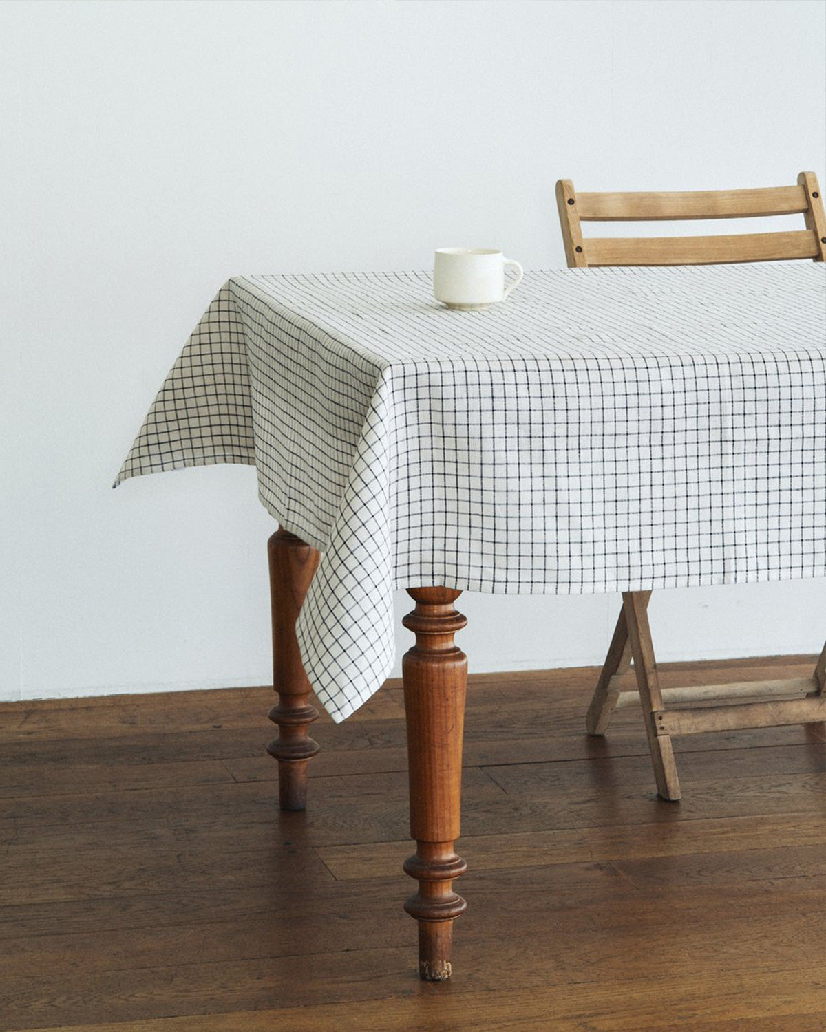 Dining table with a cup