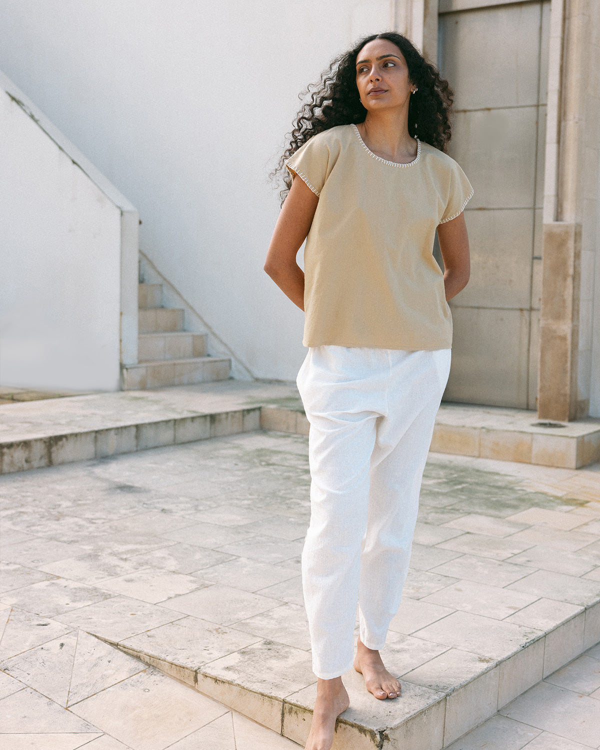 blouse and white pant